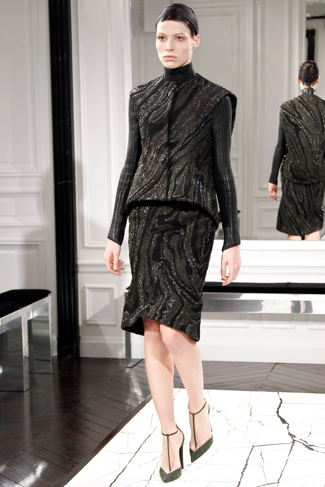 black fitted silk top and skirt