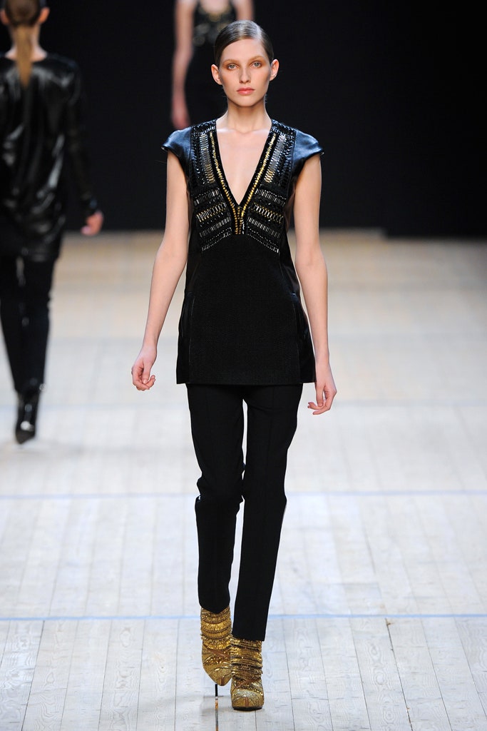 black fitted top with gold shoes