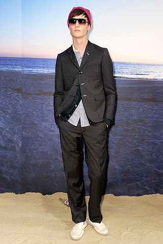 black tailored suit with blue shirt