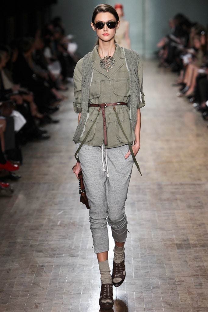 green relaxed jacket with gray pants