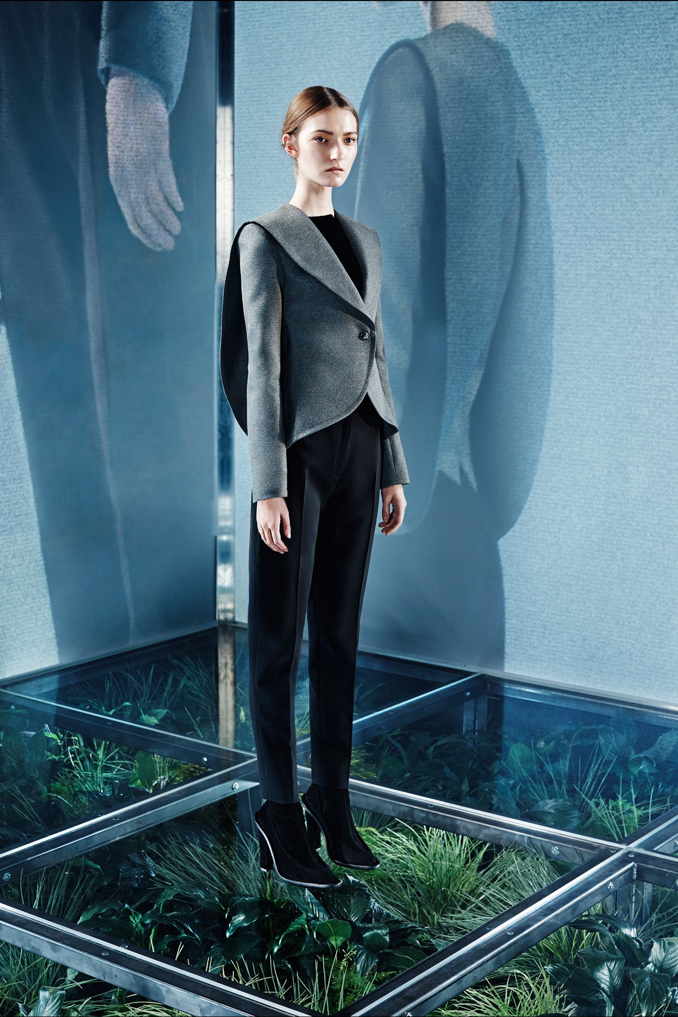 gray structured jacket with black pants