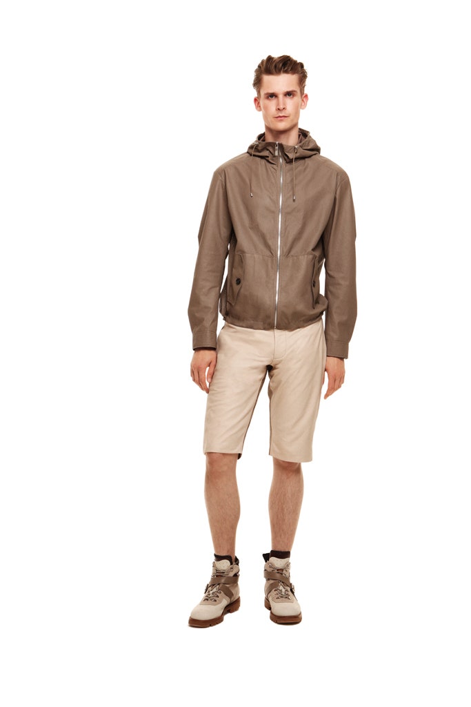 brown vinyl jacket with beige shorts