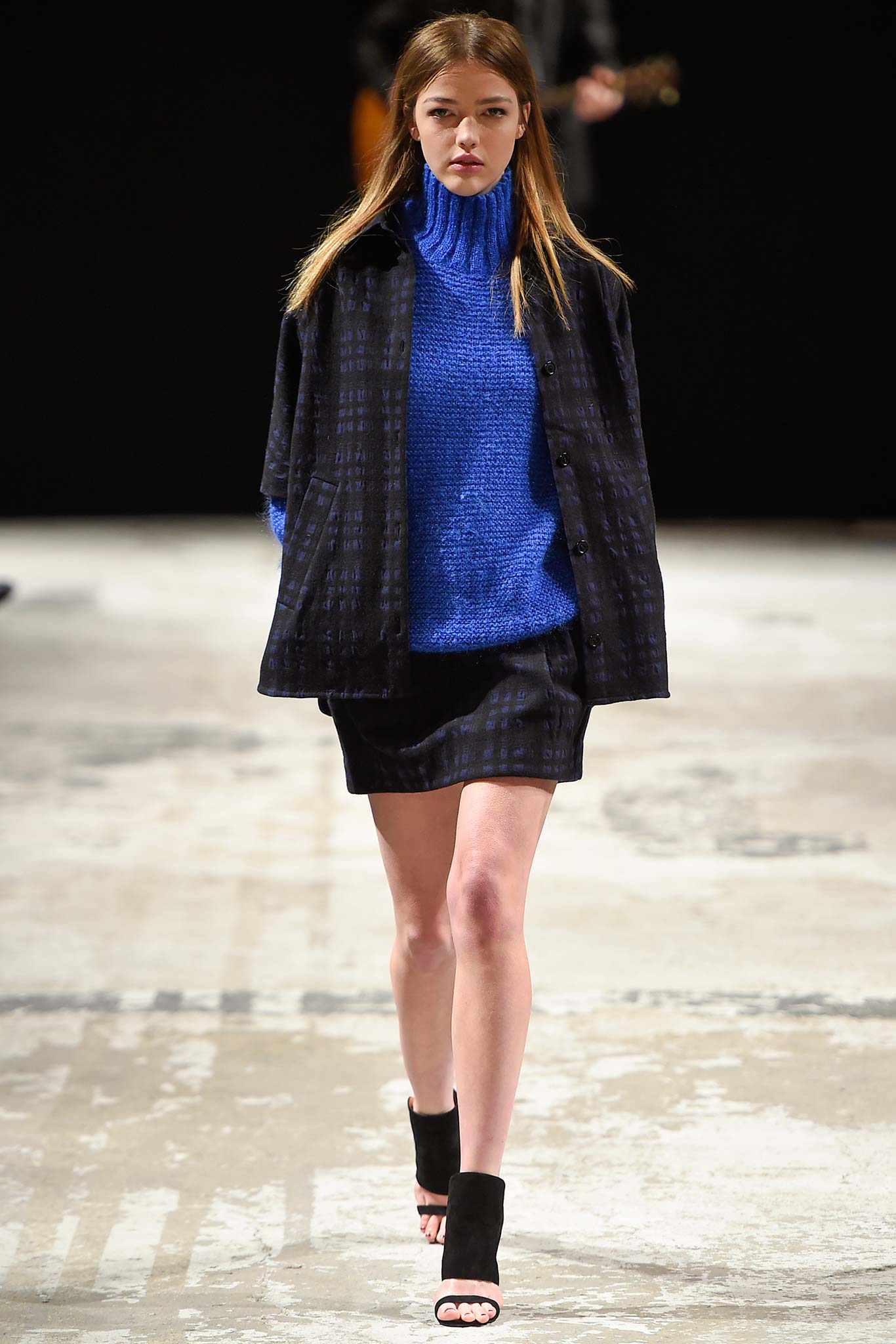 blue fitted turtleneck top with black pencil skirt