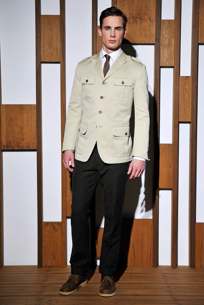 beige tailored jacket with black pants