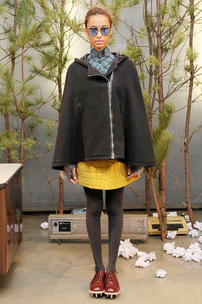 black wool cape with yellow skirt