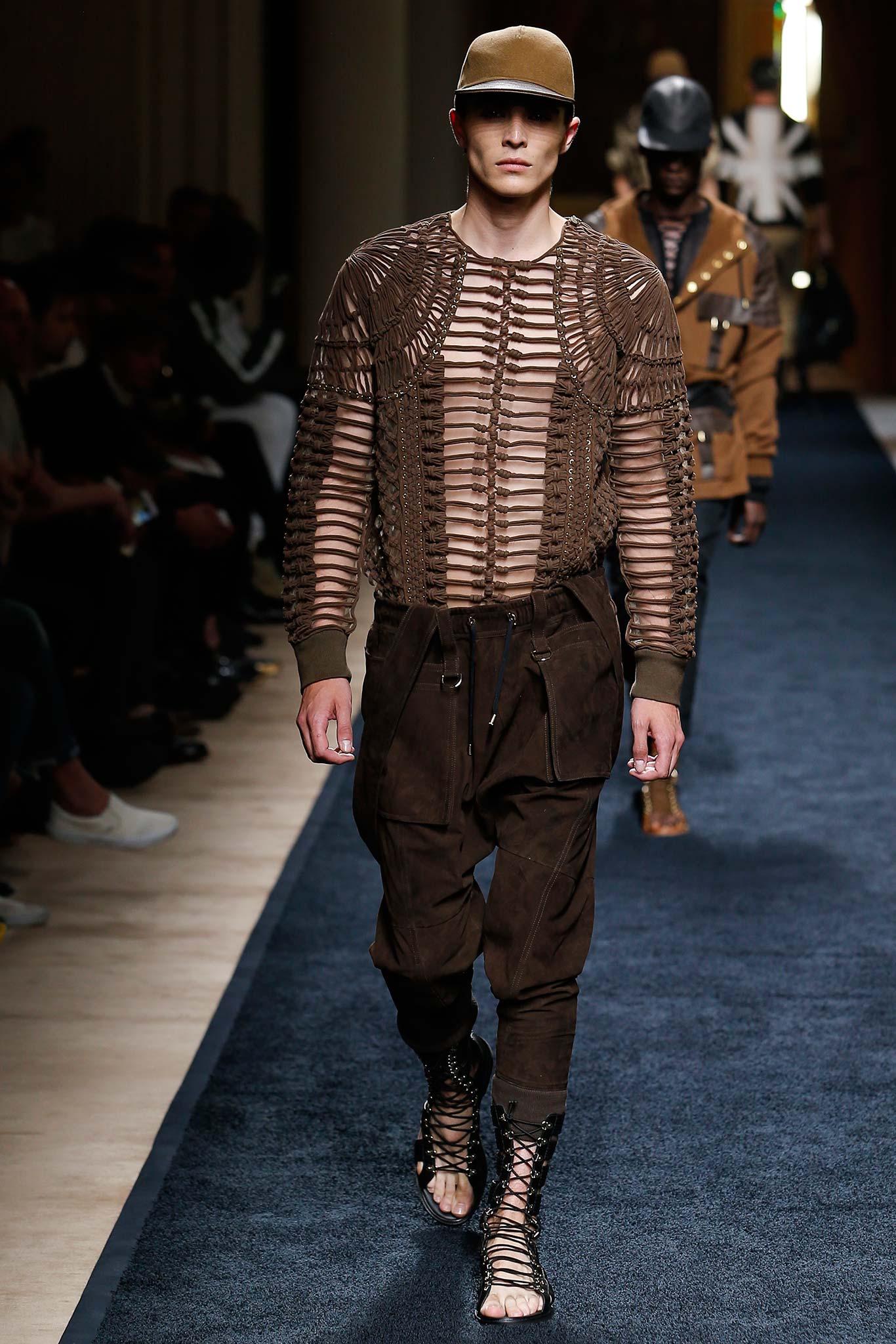 brown layered top with relaxed pants