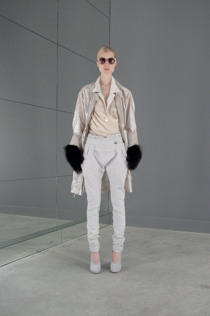 silver vinyl coat with beige blouse