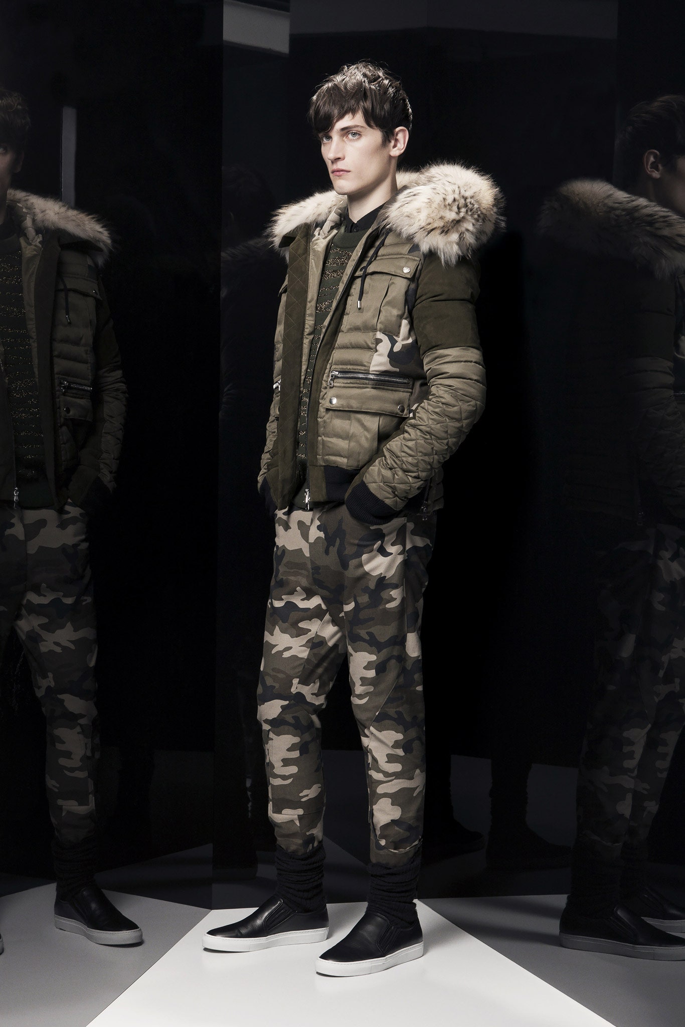 green faux-fur jacket with camouflage pants