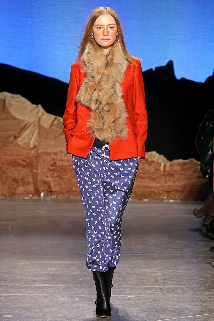 red tailored blazer with fur scarf
