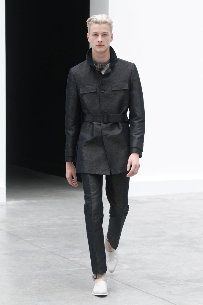 black fitted coat with slim pants