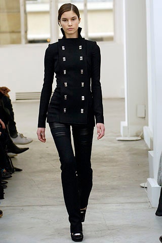 black fitted top and slim pants