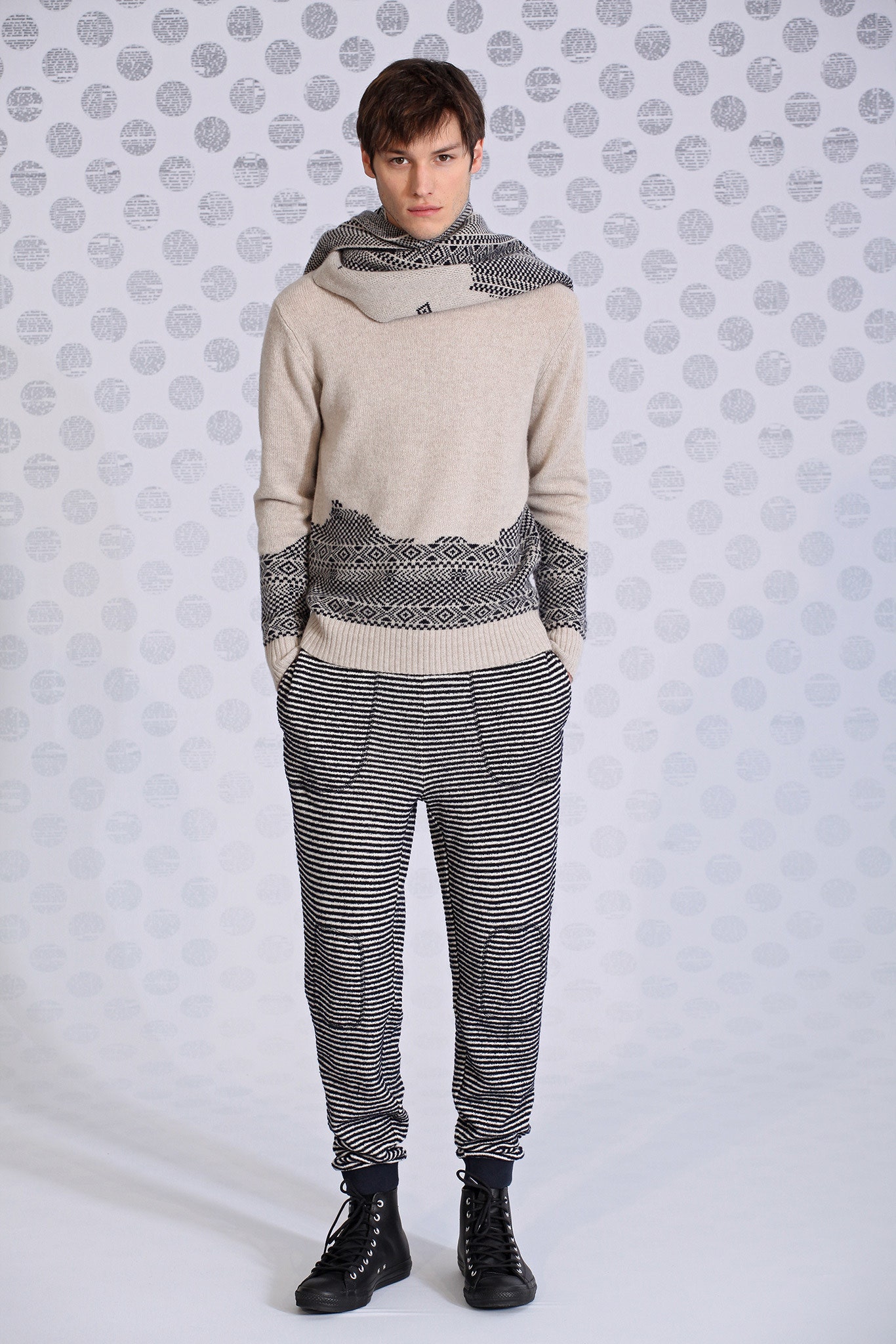 beige hooded sweater with striped pants