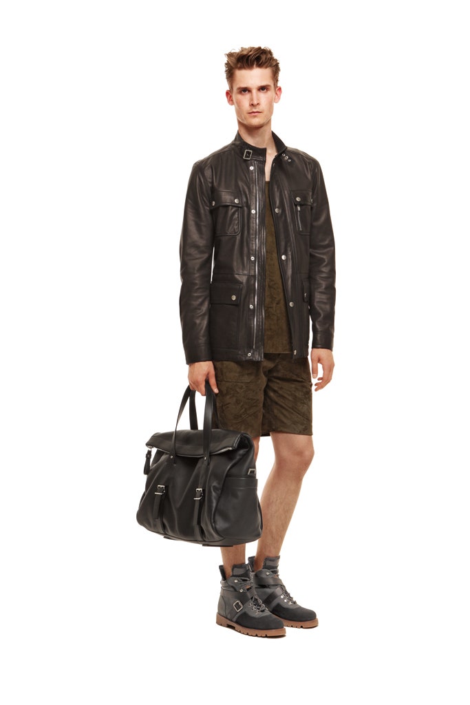 black leather jacket with green shorts