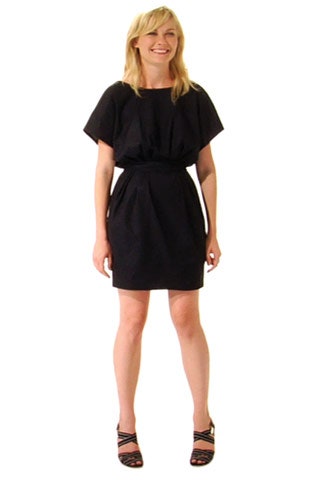black fitted dress with strappy shoes