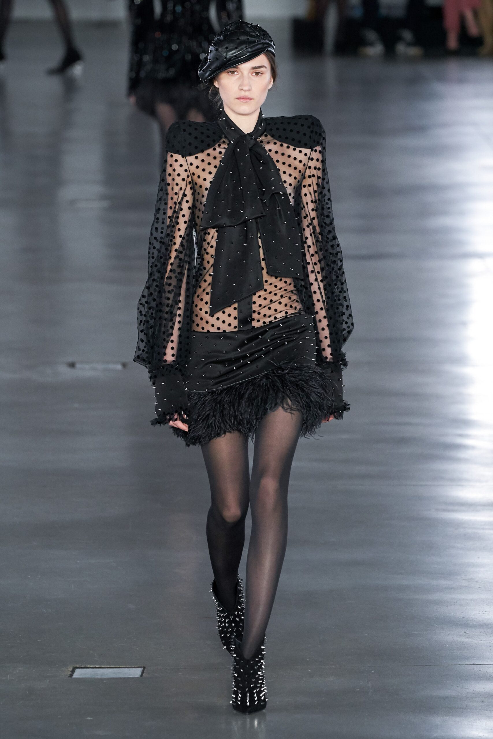 black polka-dot mini dress