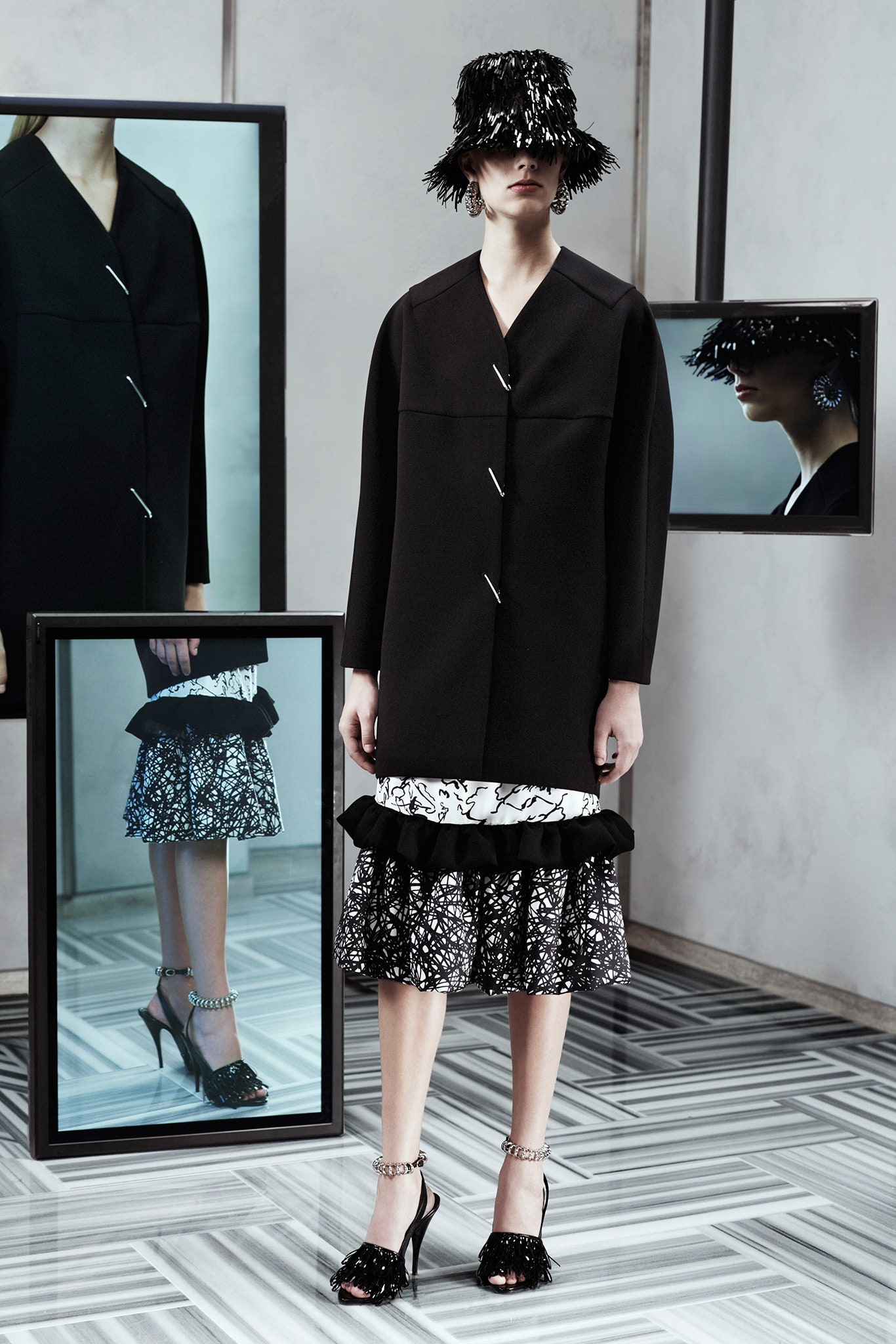 black wool coat with layered skirt