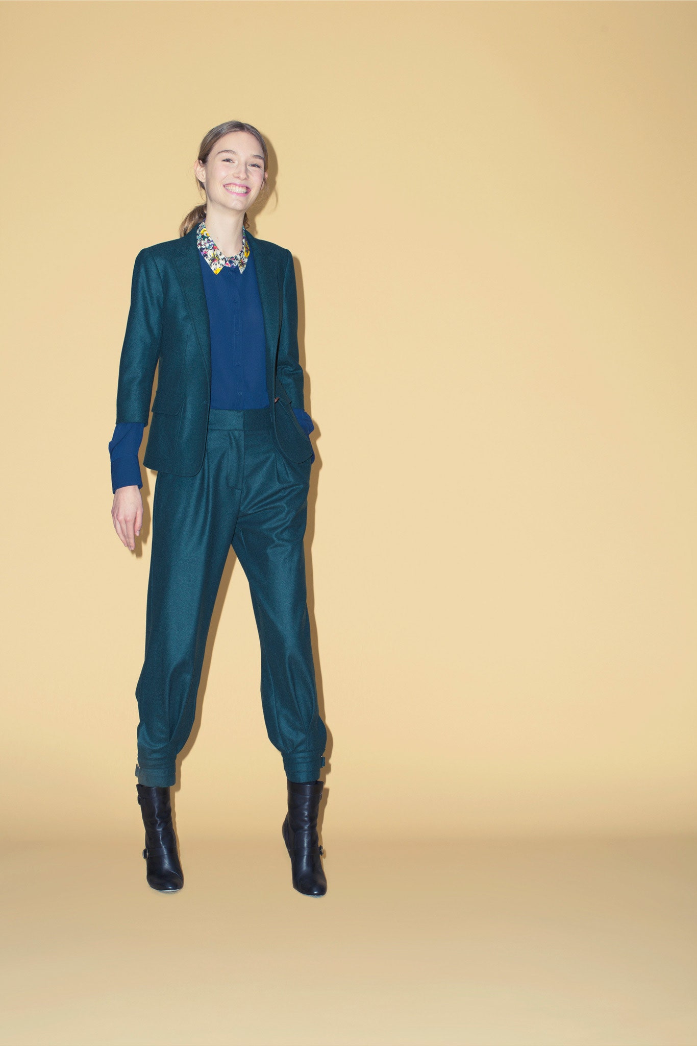 teal tailored blazer and relaxed pants