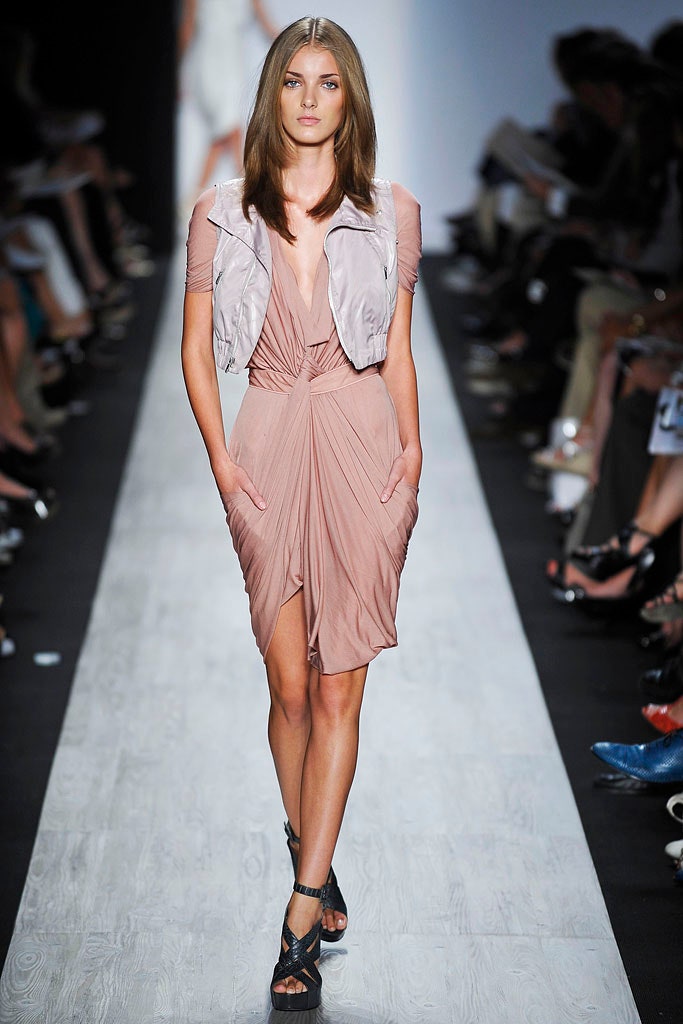 pink draped mini dress with gray vest