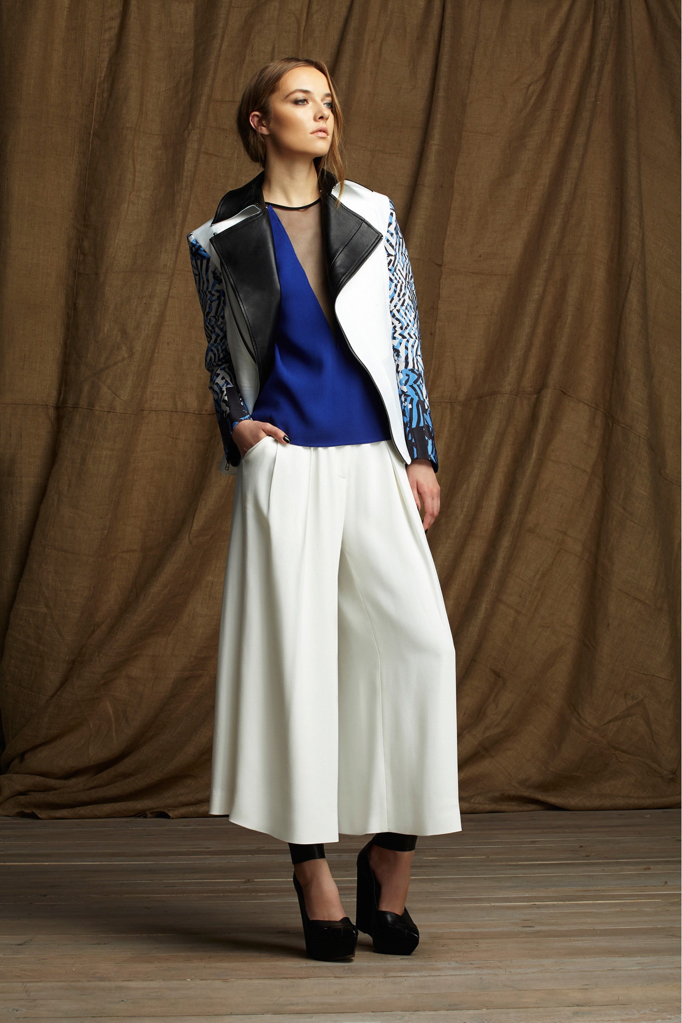 fitted black and blue jacket with wide-leg pants