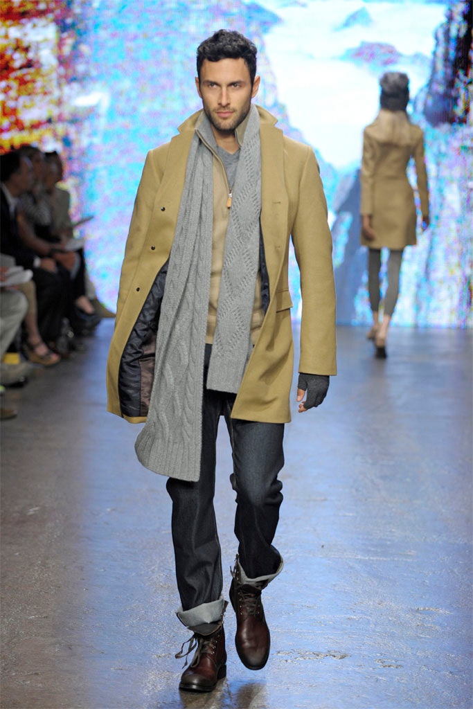 beige tailored coat with gray sweater