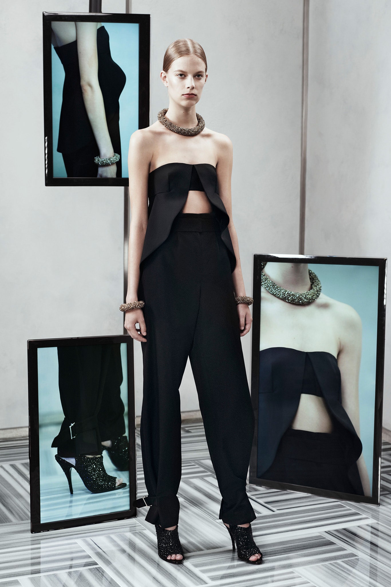 black silk strapless top and tailored pants