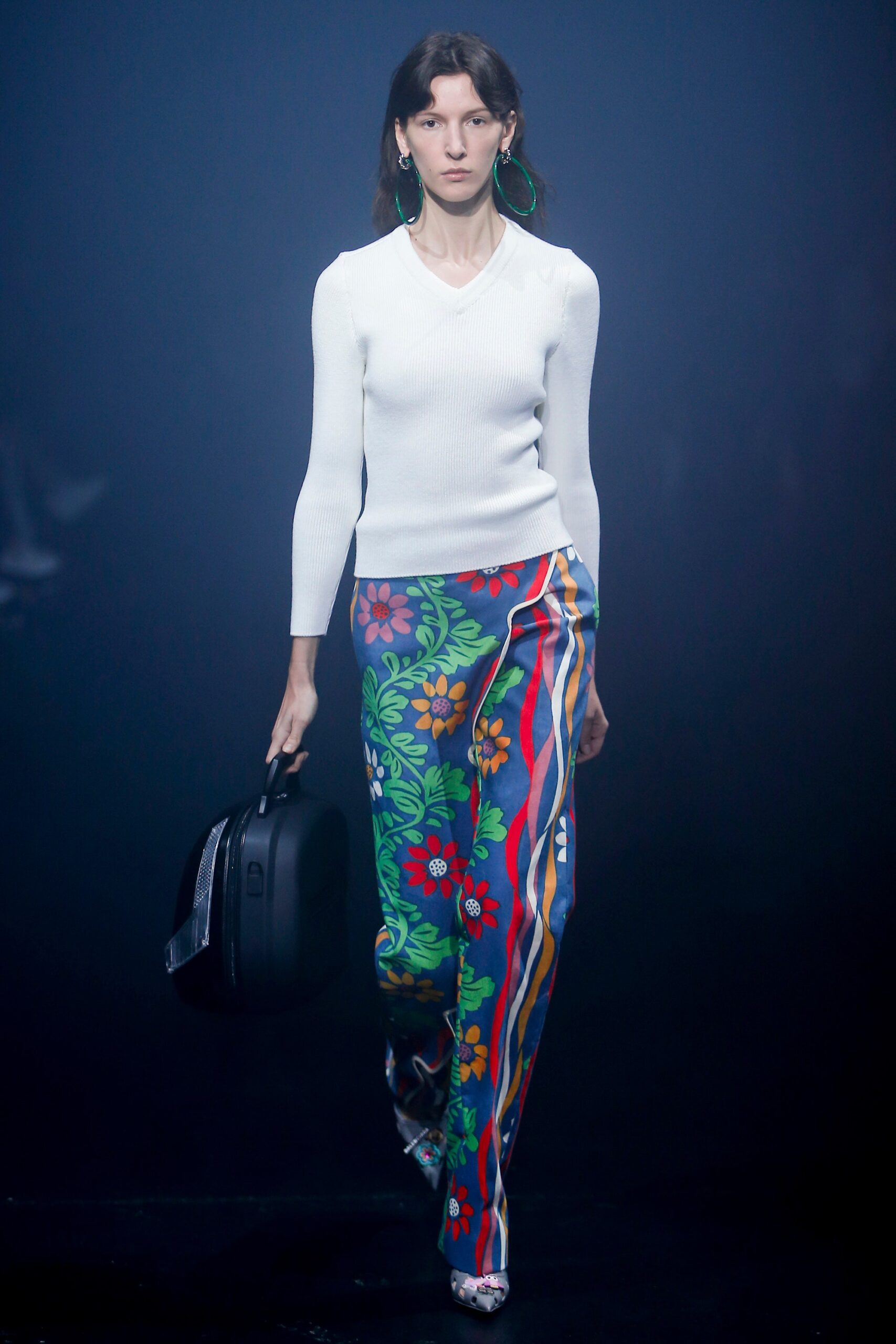 fitted white top with flared pants