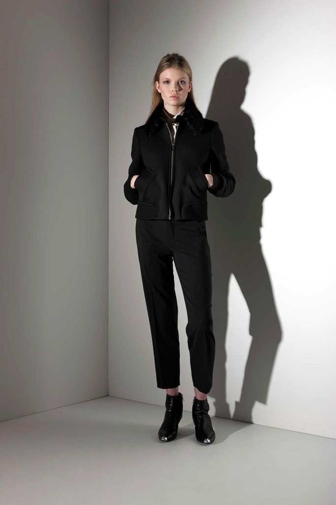 black fitted jacket and tailored pants