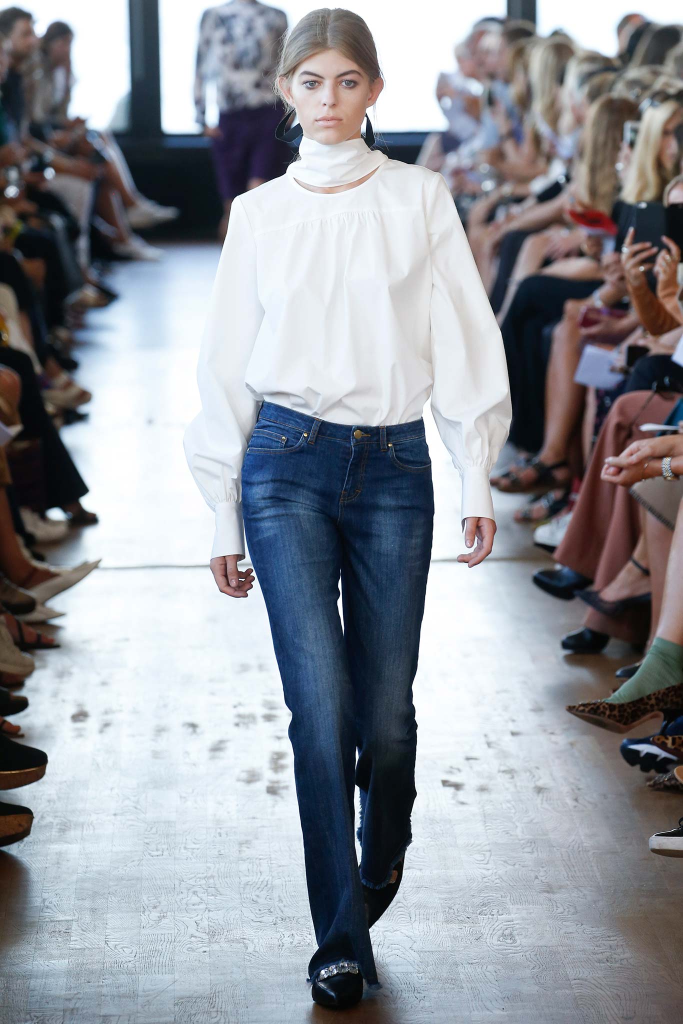 white fitted blouse with blue jeans