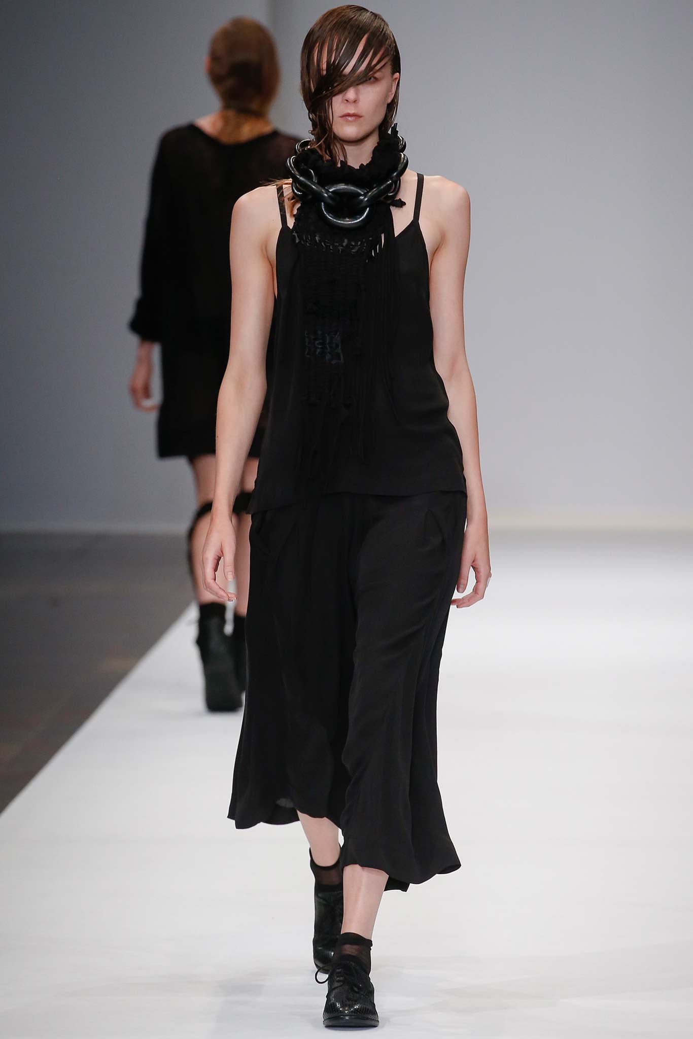 black fitted top and relaxed skirt