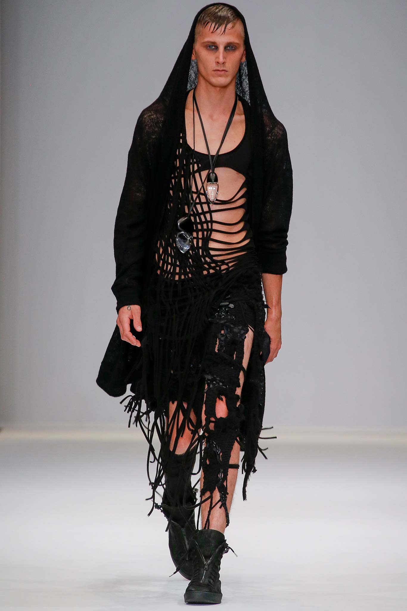 black relaxed coat with fringes