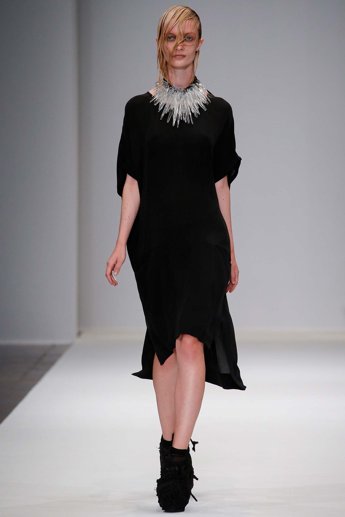 black relaxed midi dress with silver necklace