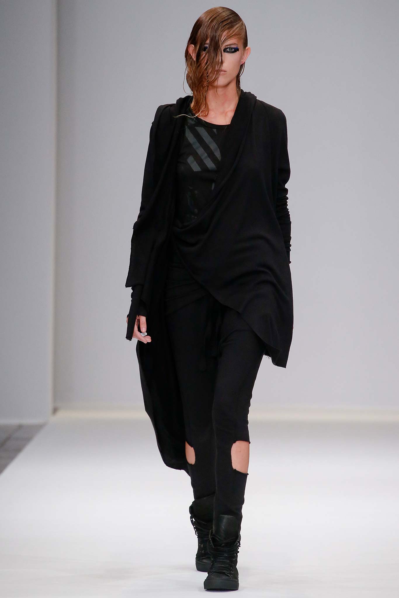 black relaxed coat with cutout pants