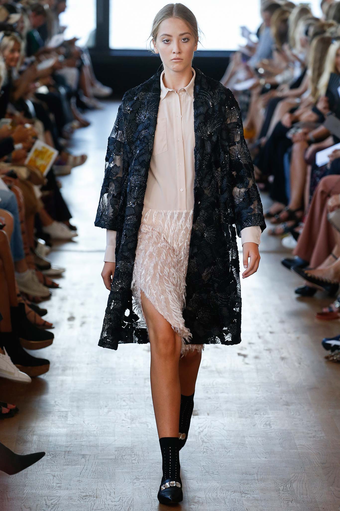 black lace coat with white shirt and skirt