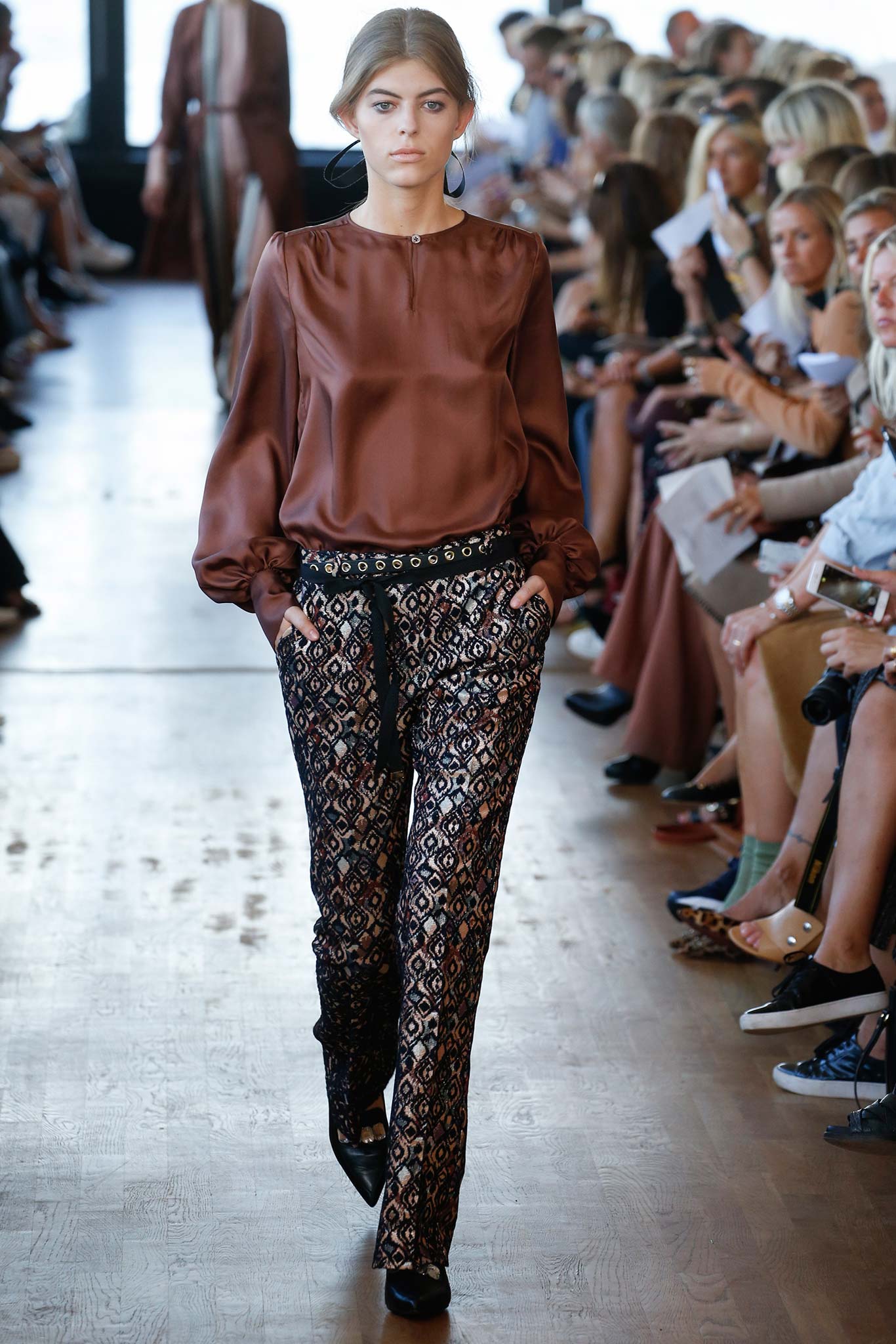 brown silk blouse with black lace pants