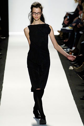 fitted black silk sleeveless dress