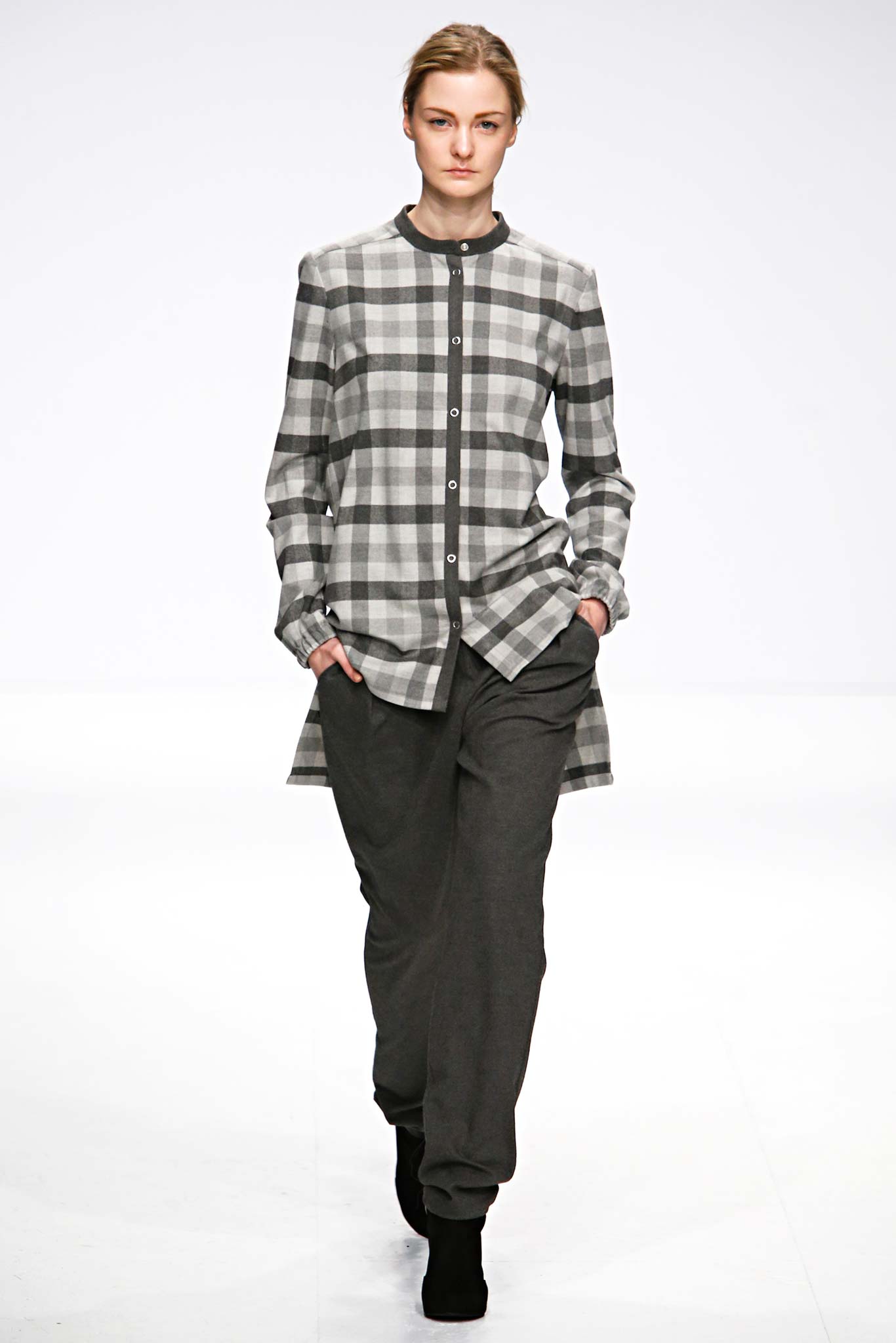 gray checked shirt with black pants