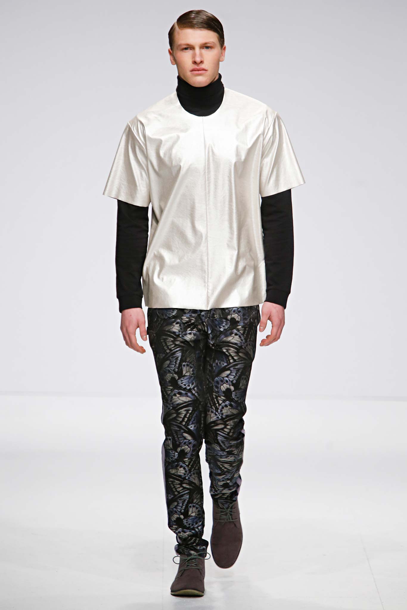 white silk relaxed top with black pants