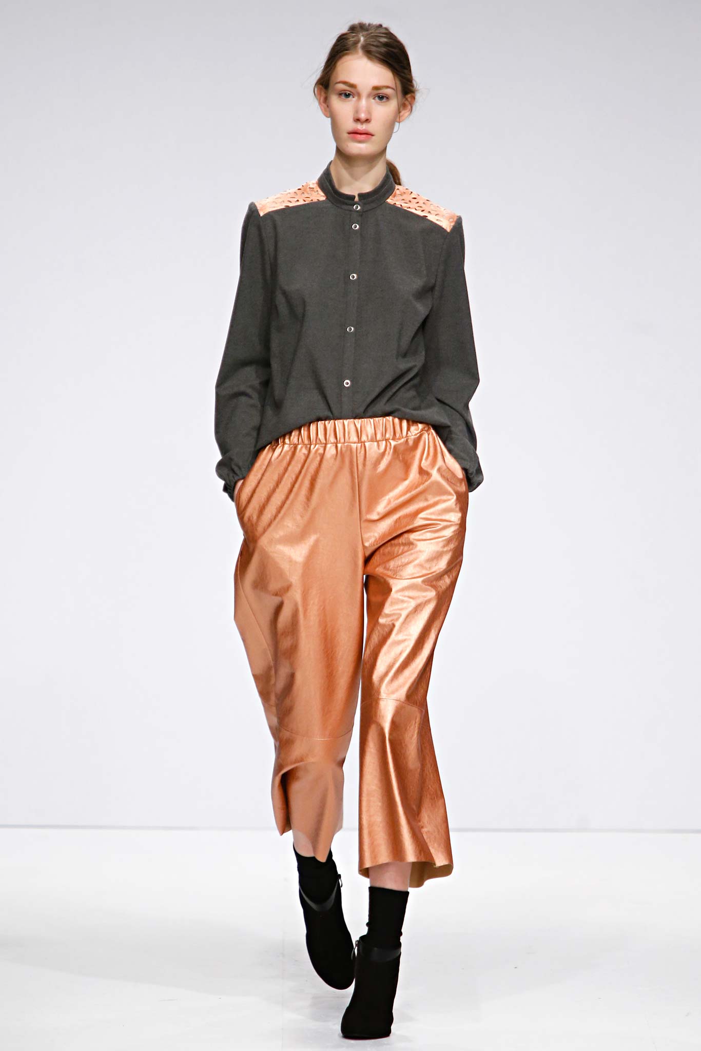 gray shirt and orange pants