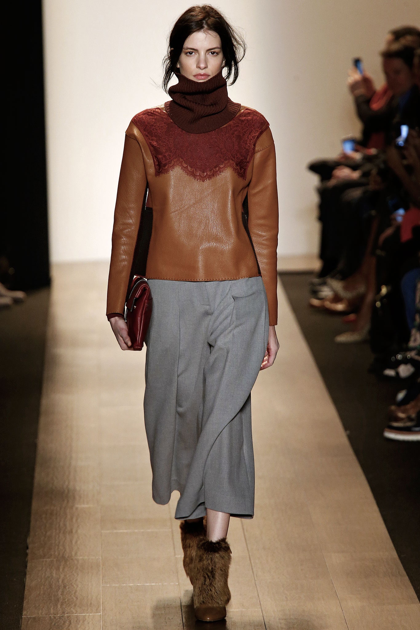 brown leather top with wide-leg pants