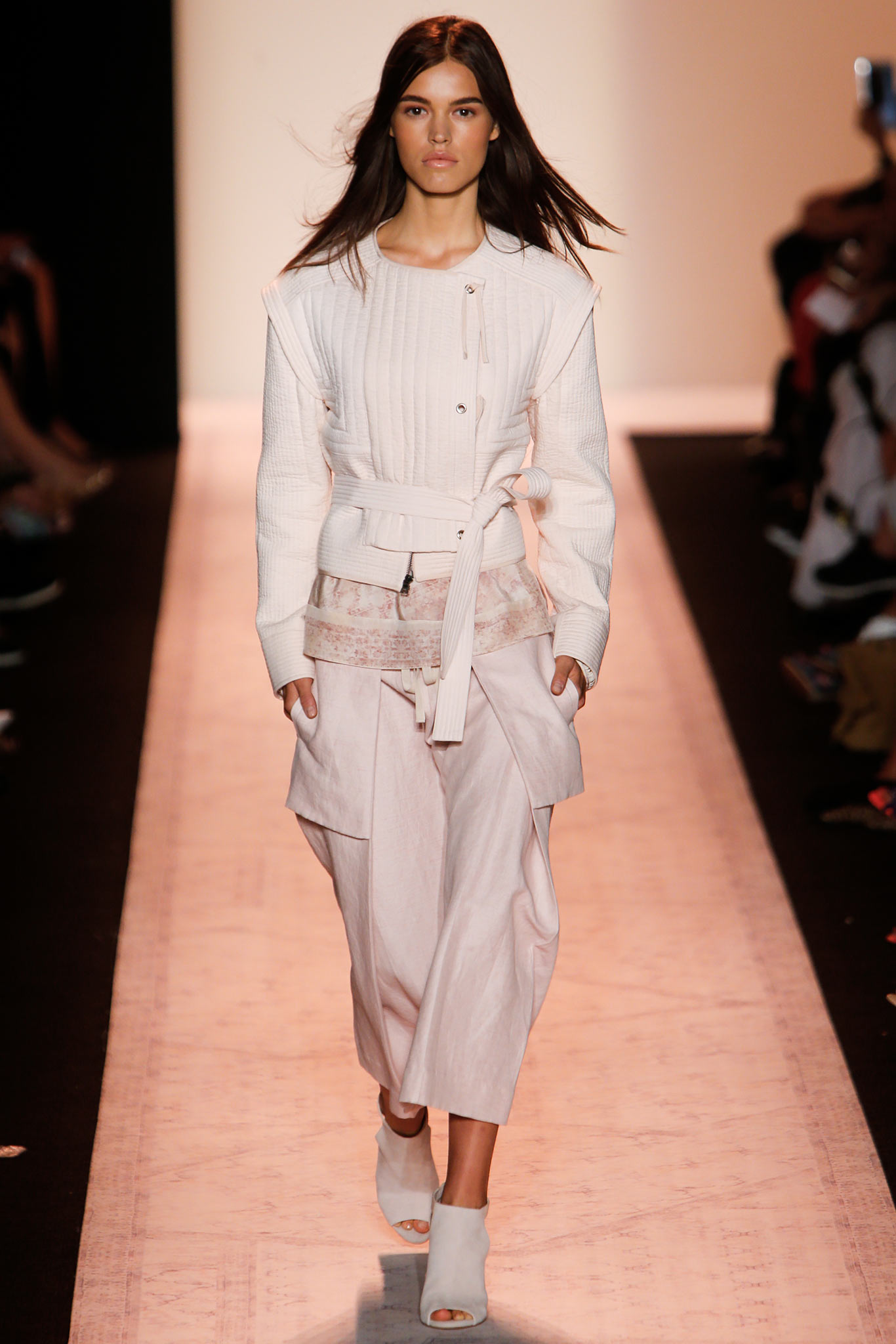 white fitted jacket with relaxed pink pants