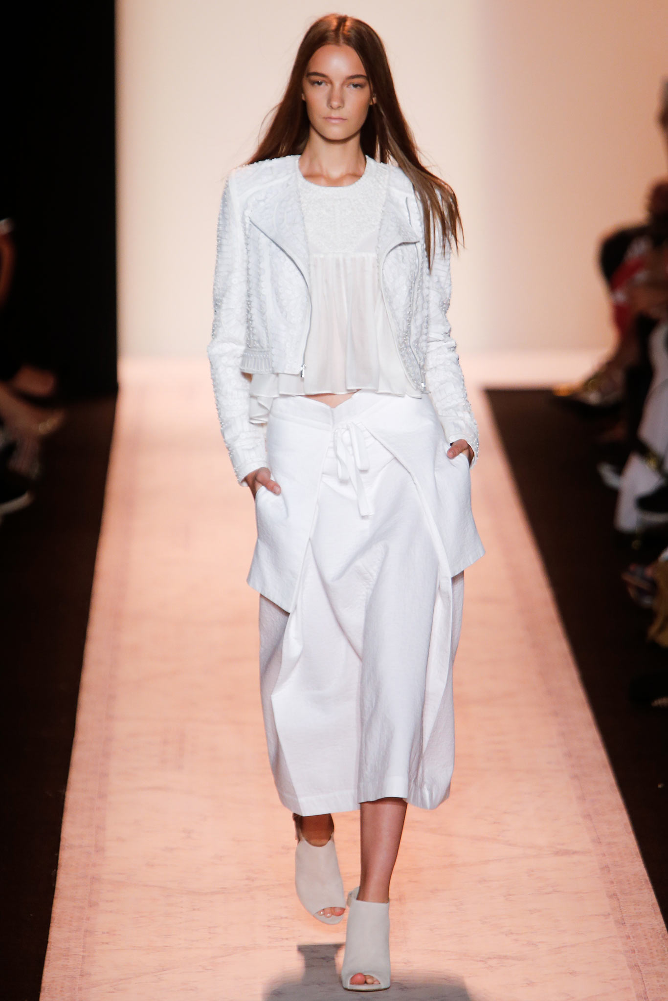 white fitted jacket with pleated skirt
