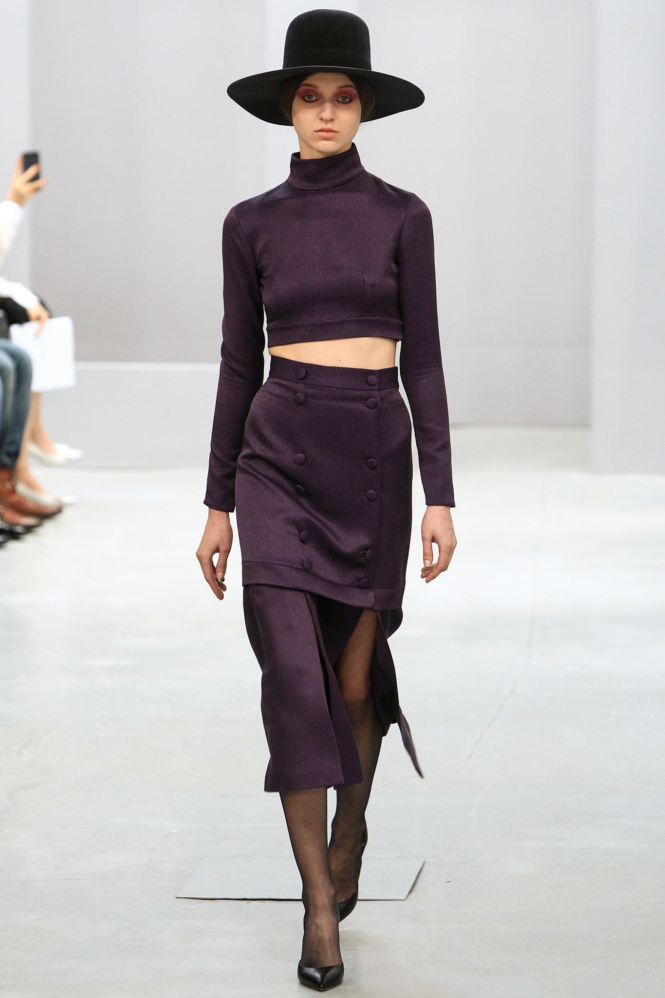 purple fitted top and skirt