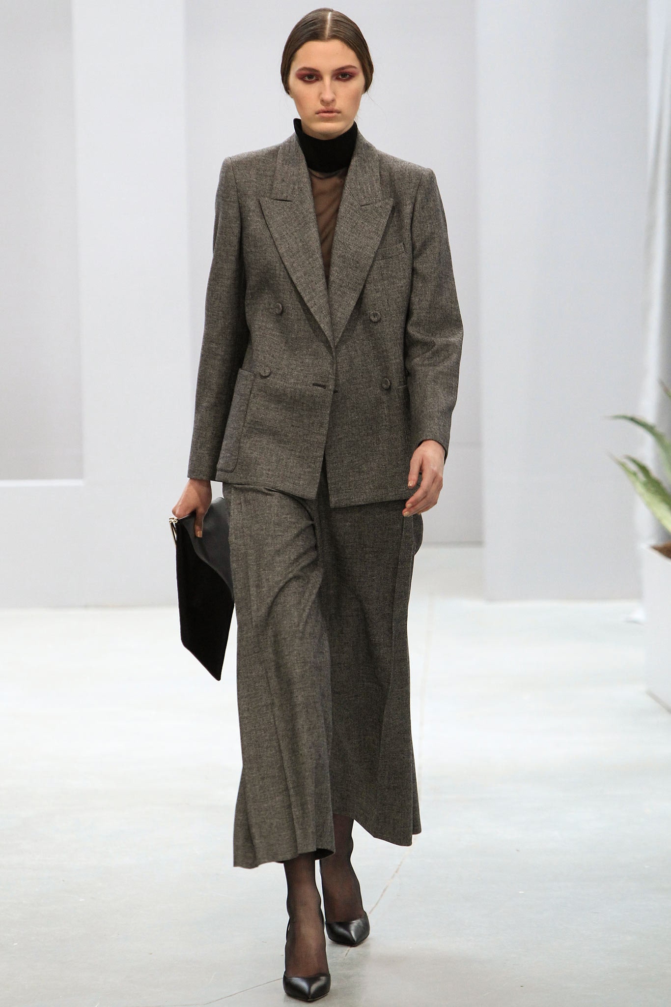 gray tailored suit with black top