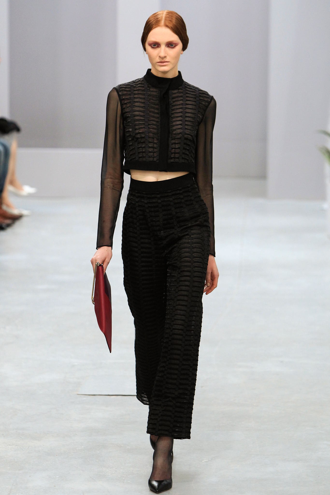 black fitted silk top and pants