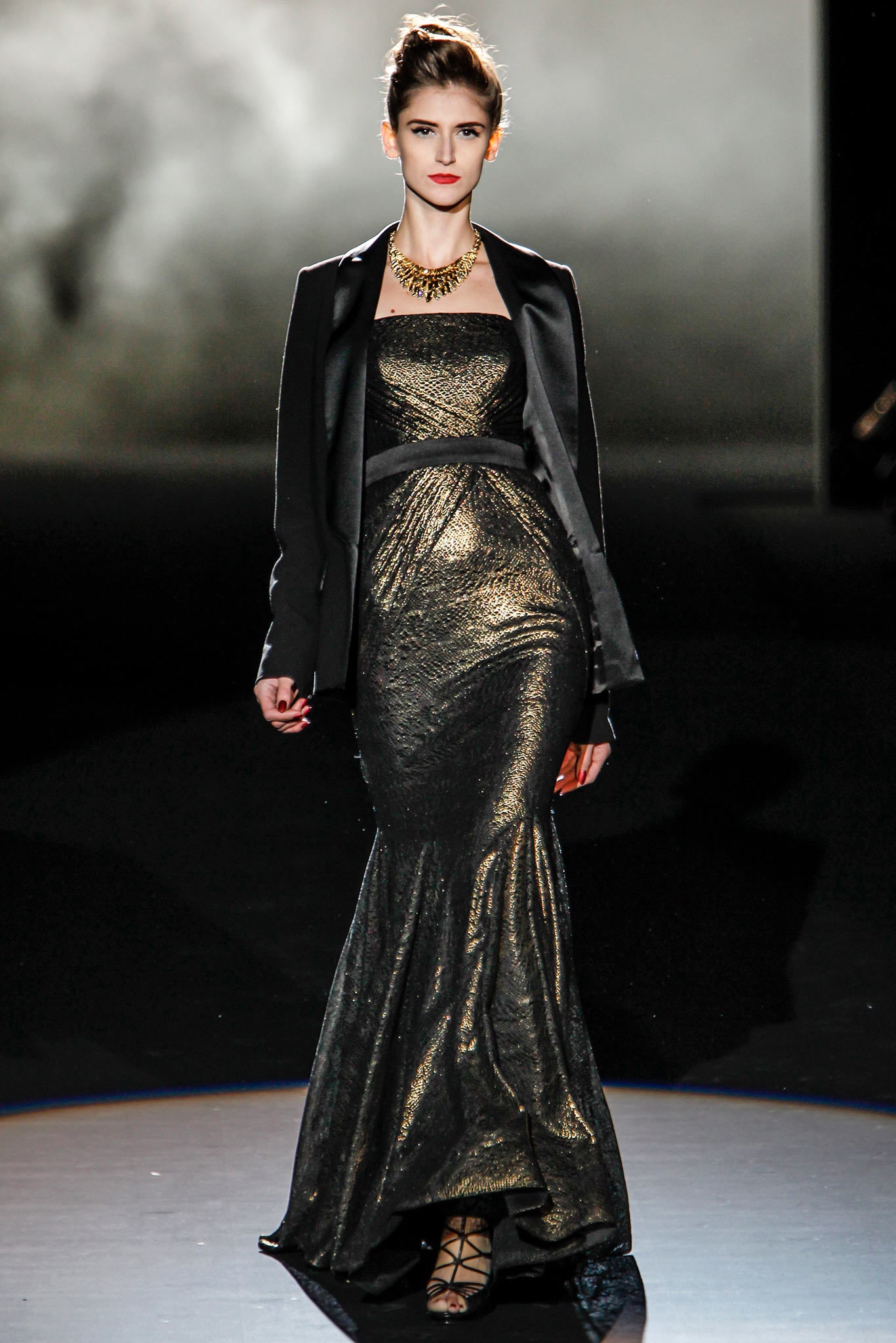 black and gold fitted gown with blazer