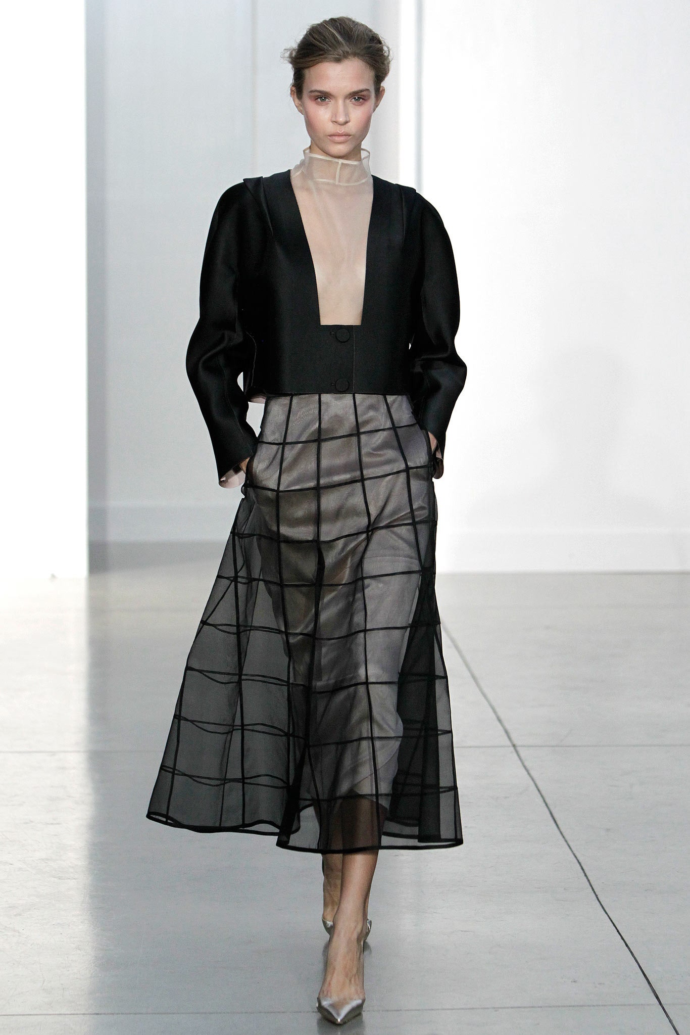 black silk fitted jacket with beige dress