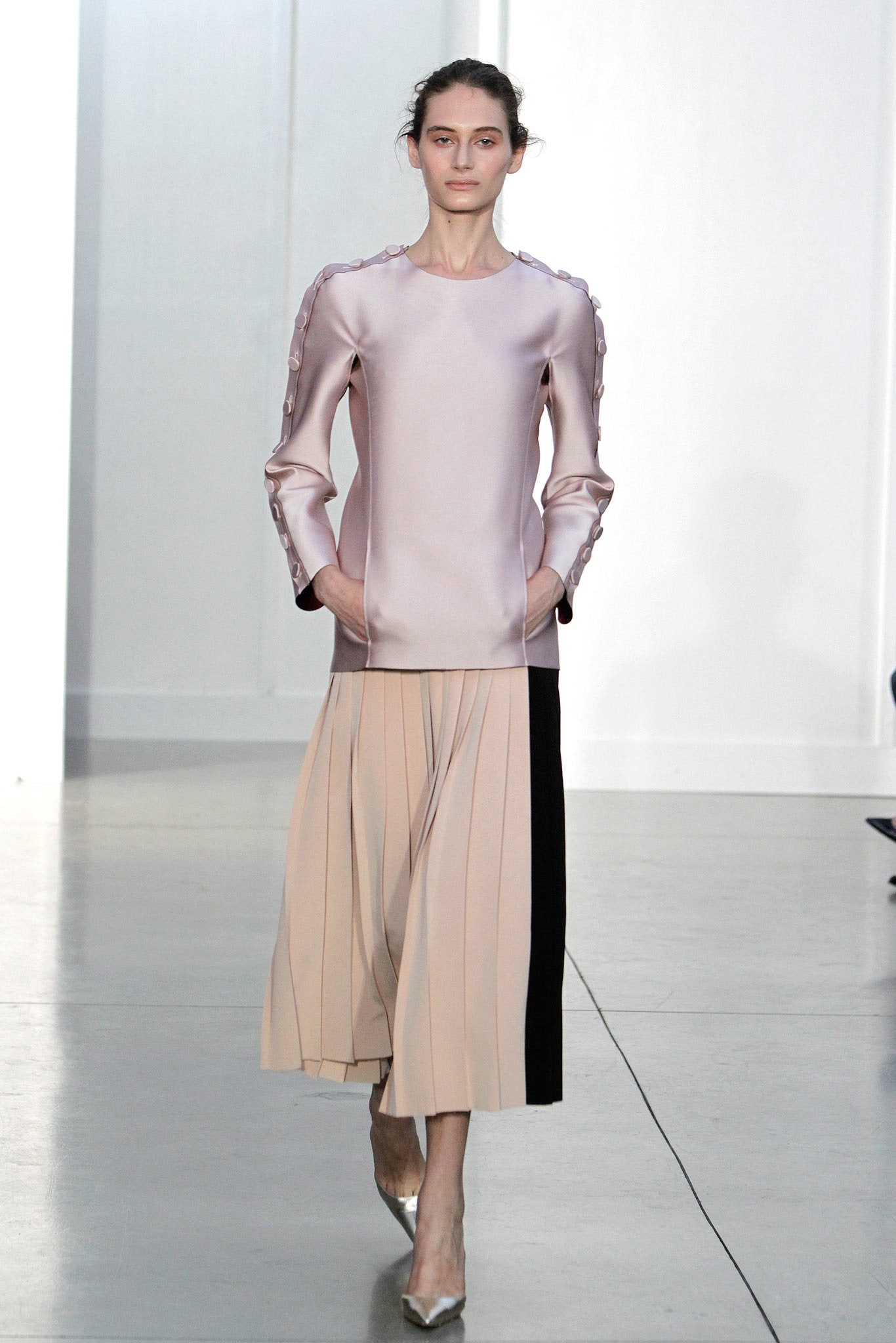 pink silk top beige pleated skirt