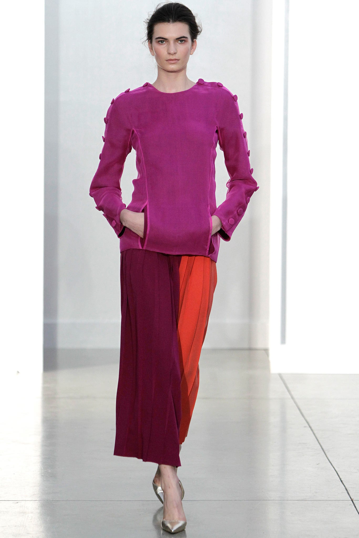 pink silk top with pleated pants