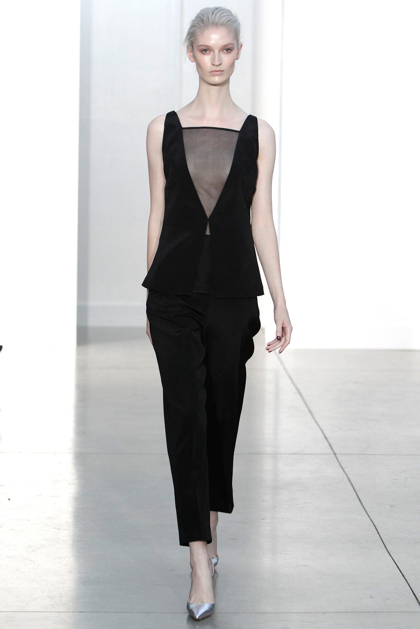 black silk fitted top and tailored pants