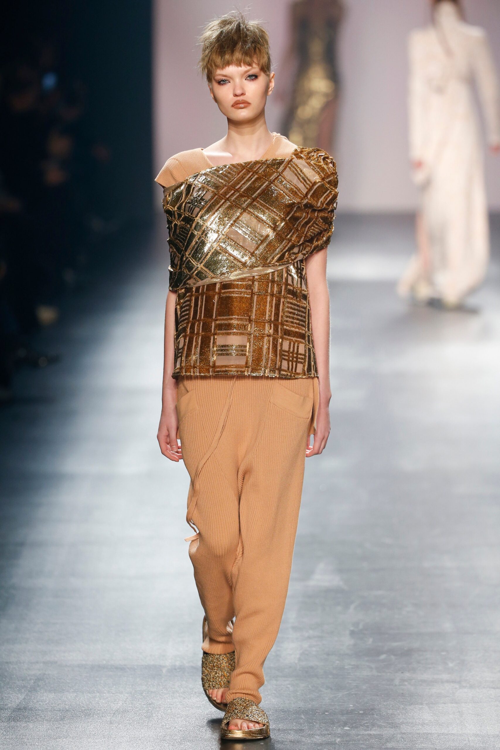 gold and brown layered top with relaxed pants